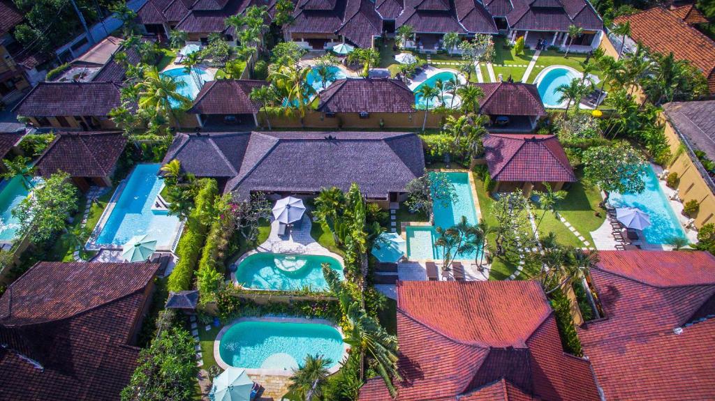 an aerial view of a resort with swimming pools at Bali Dyana Villas in Seminyak