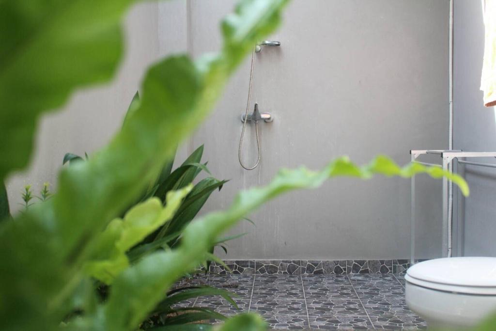 Purnama Guesthouse - 8