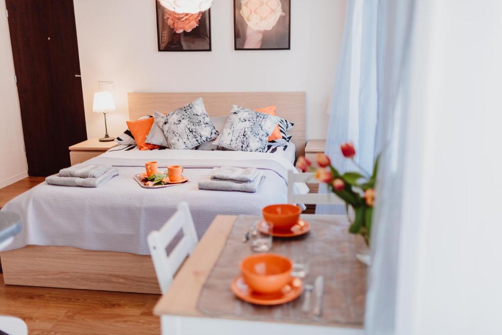 Posteľ alebo postele v izbe v ubytovaní Garden Apartment