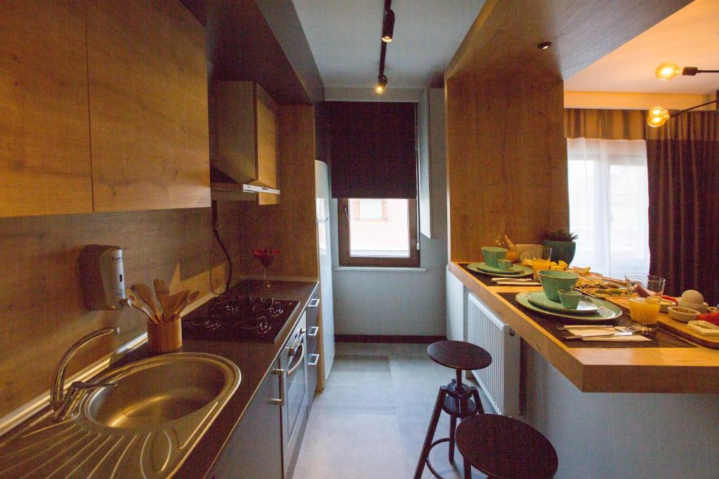 A kitchen or kitchenette at Cityloft 36