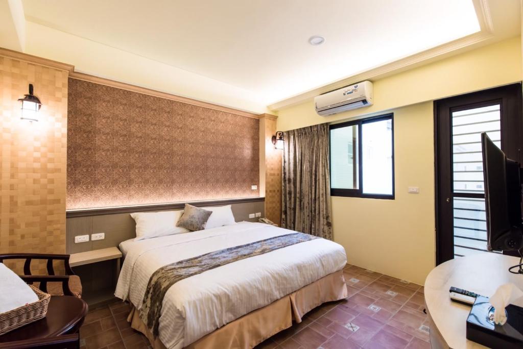 Postel nebo postele na pokoji v ubytování Tiamo B&B