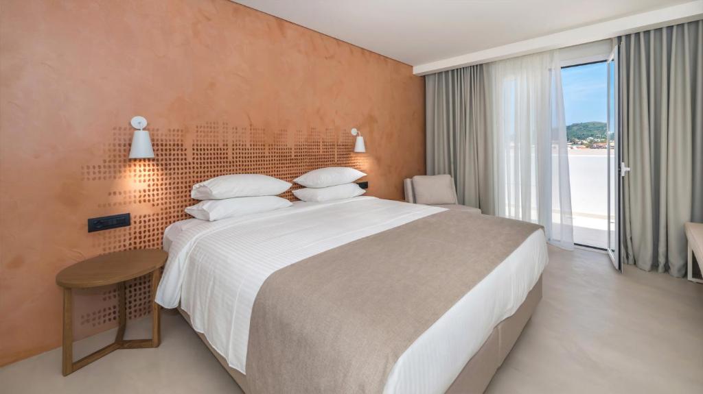 Postelja oz. postelje v sobi nastanitve Bitzaro Grande Hotel & Suites