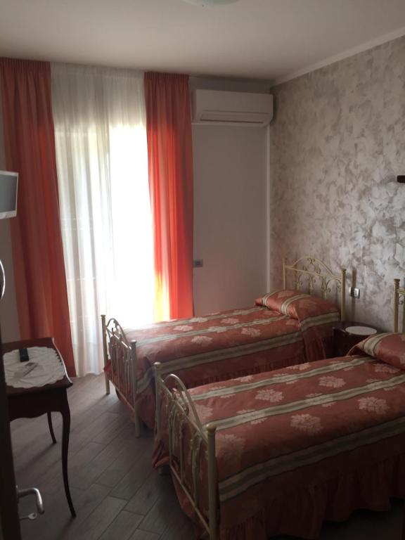 A bed or beds in a room at San Michele