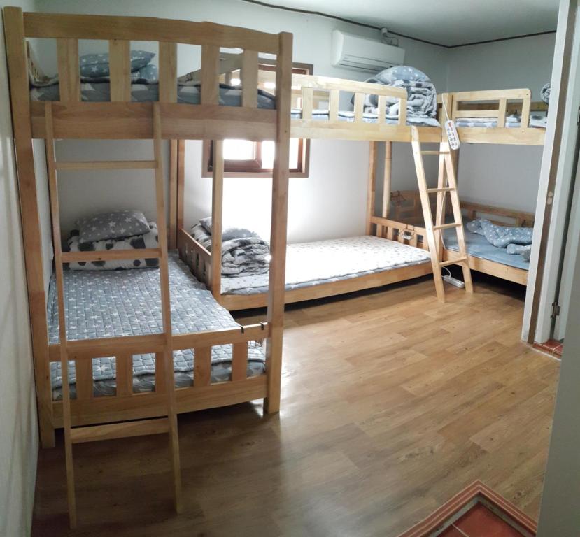 Postel nebo postele na pokoji v ubytování Friends of Loft