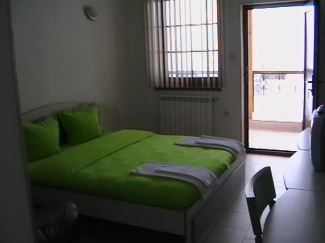 Ένα ή περισσότερα κρεβάτια σε δωμάτιο στο Rooms for Guests Bakhus