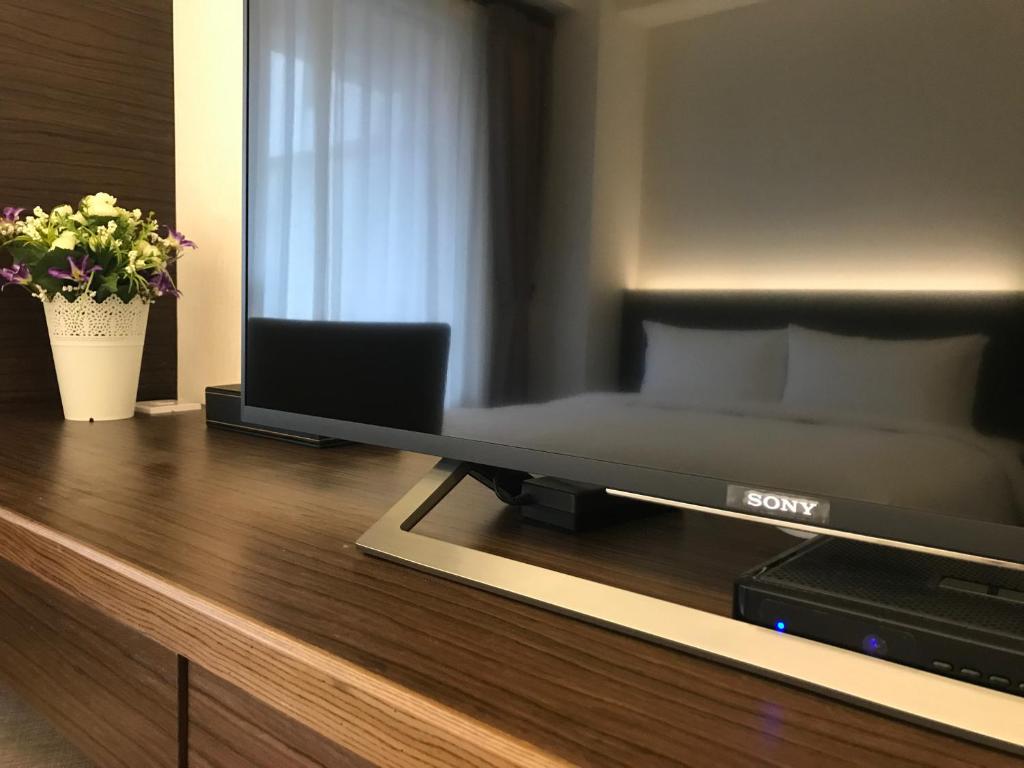 TV a/nebo společenská místnost v ubytování 晨光飯店