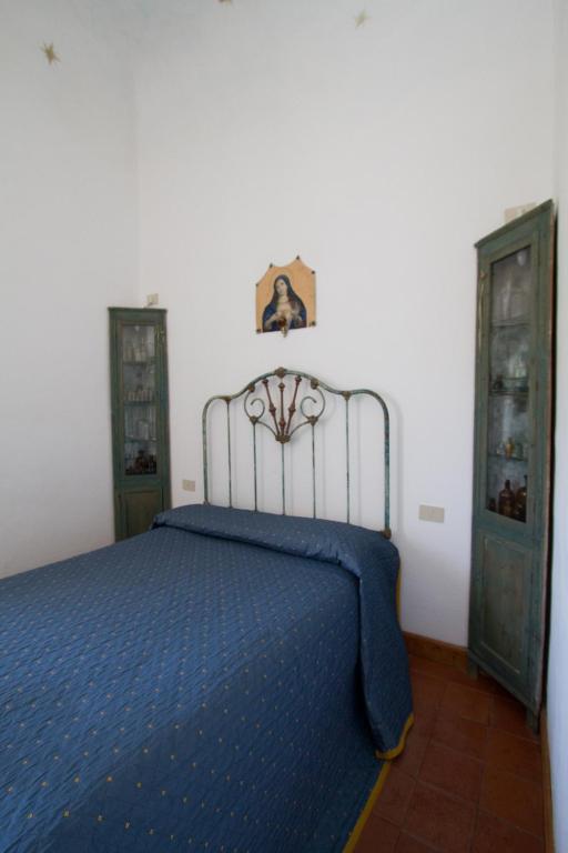 Postel nebo postele na pokoji v ubytování La Locanda del Barbablù
