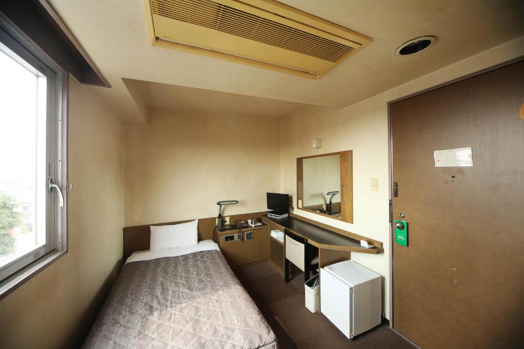 TV a/nebo společenská místnost v ubytování Isesaki Harvest Hotel