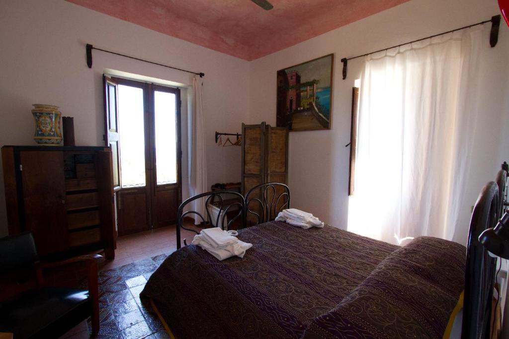 Postel nebo postele na pokoji v ubytování La Locanda del Barbablù