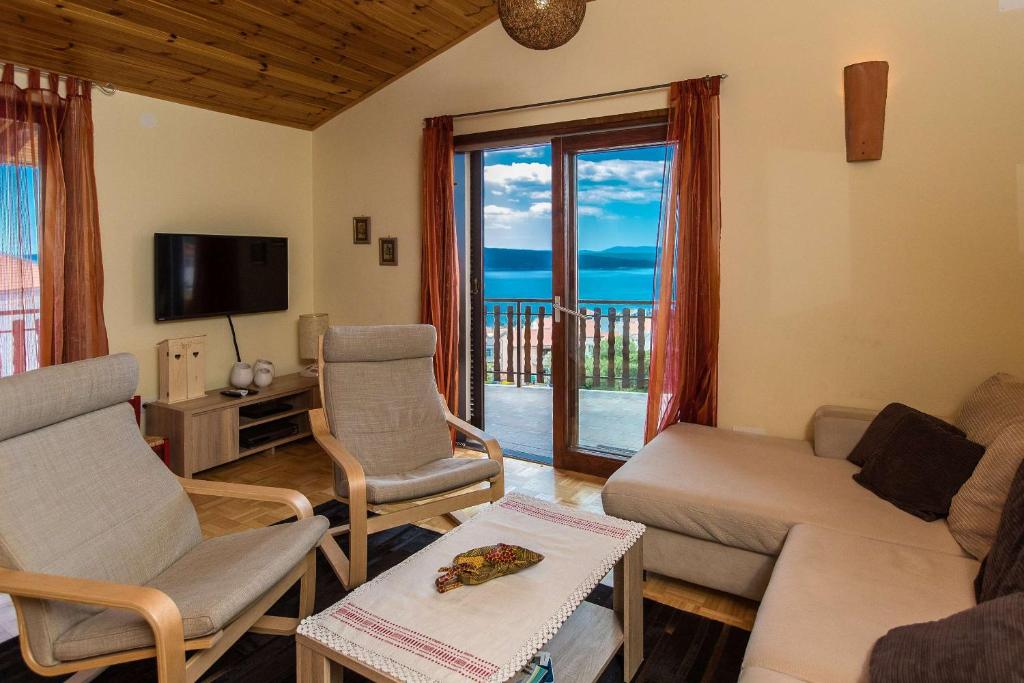 TV a/nebo společenská místnost v ubytování Apartments Faro & Mondo