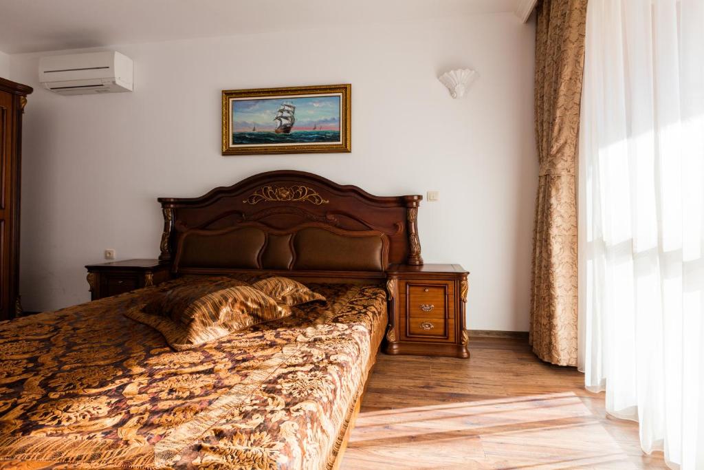 Postel nebo postele na pokoji v ubytování Boutique Apart Hotel Versis