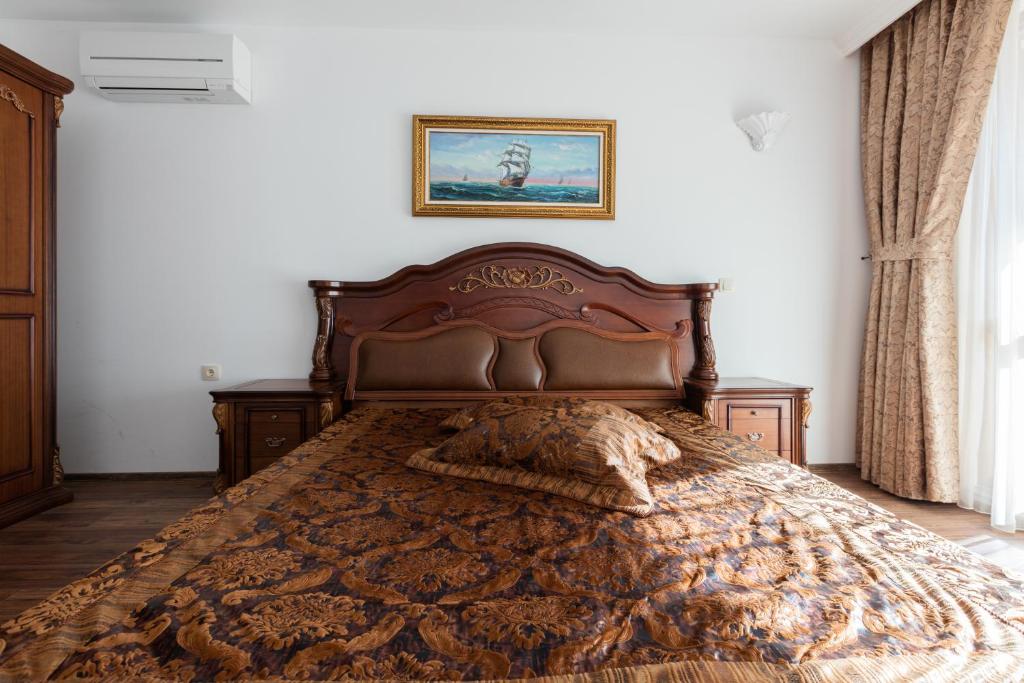 Postel nebo postele na pokoji v ubytování Boutique Apart Hotel Versis