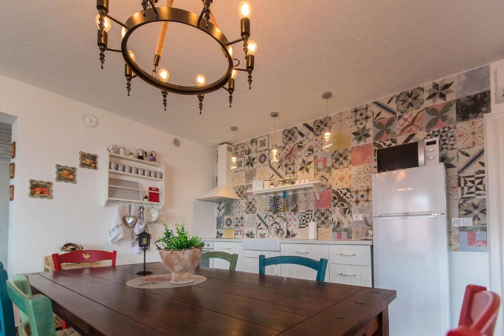 Kuchyň nebo kuchyňský kout v ubytování Apartments Faro & Mondo
