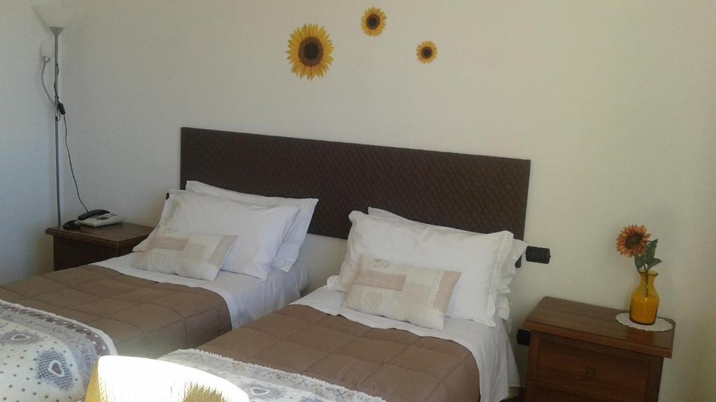 Postel nebo postele na pokoji v ubytování B&B MiraValle