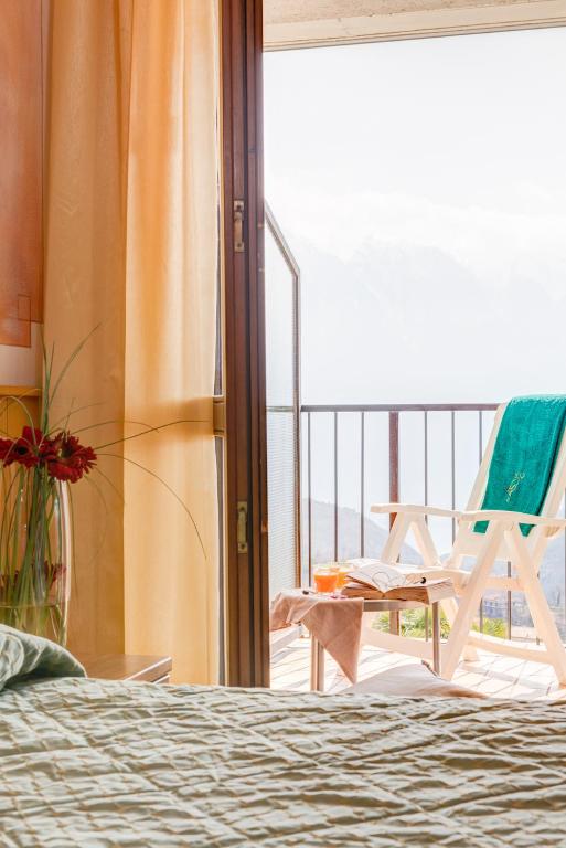 Postel nebo postele na pokoji v ubytování Hotel La Fenice e Sole