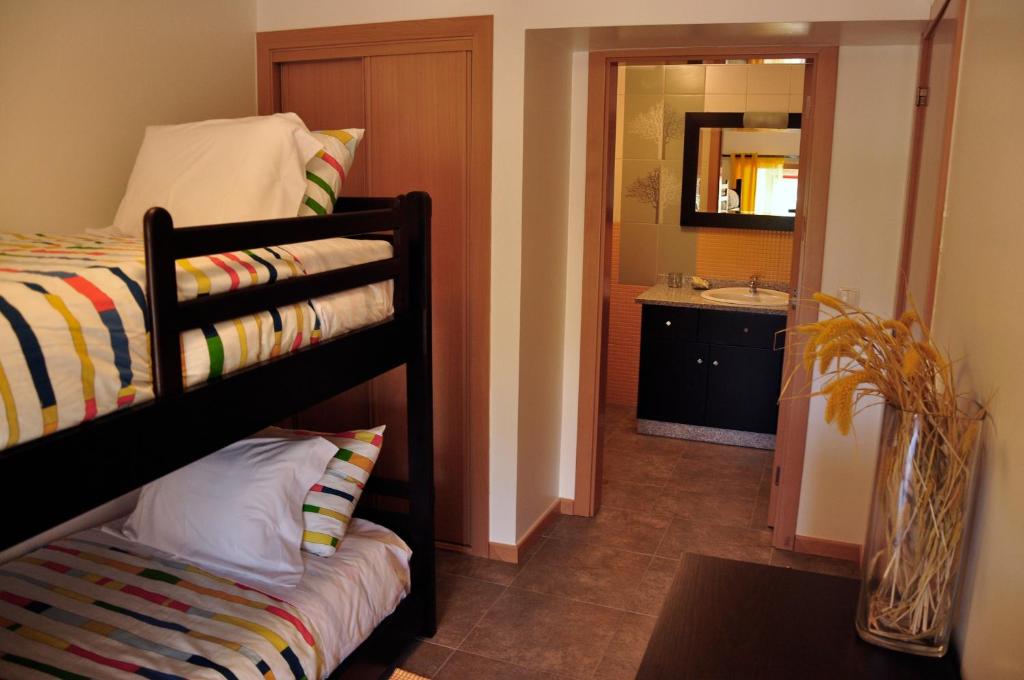 Uma cama ou camas num quarto em Casa dos Hospitalrios