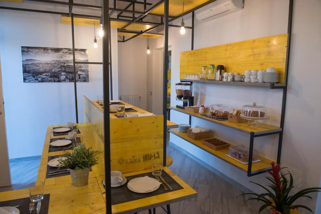 Kuchyň nebo kuchyňský kout v ubytování B&B L'Officina di Apollo