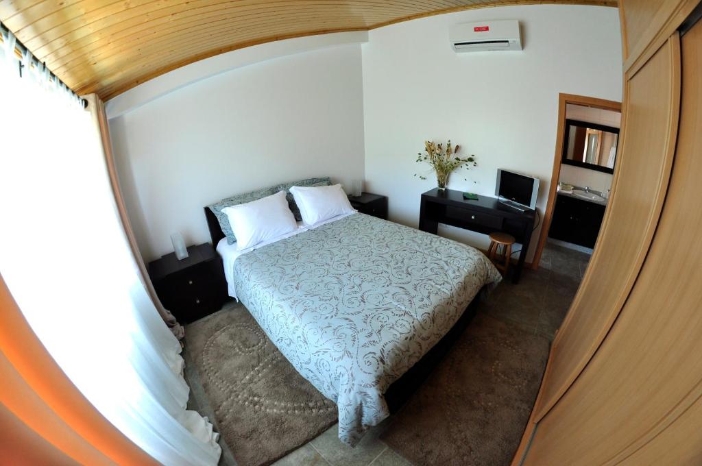 Uma cama ou camas num quarto em Casa dos Hospitalrios