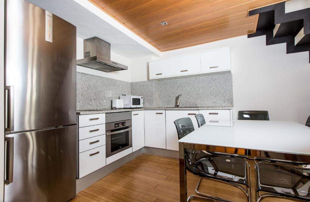Kuchyňa alebo kuchynka v ubytovaní Girona Housing Ginesta 9