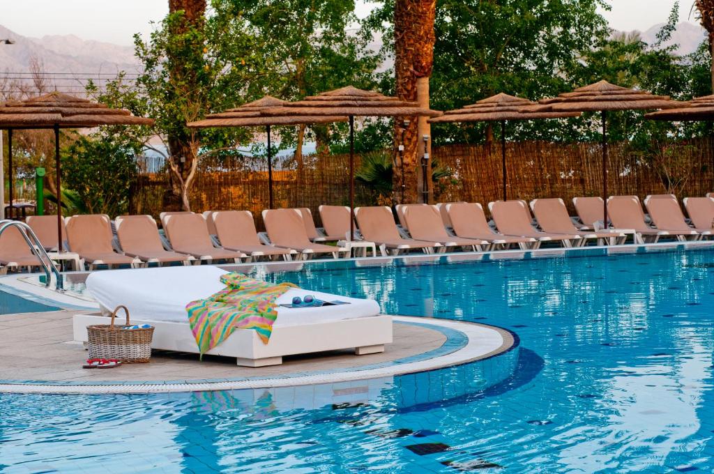 Der Swimmingpool an oder in der Nähe von U Coral Beach Club Eilat – Ultra All inclusive