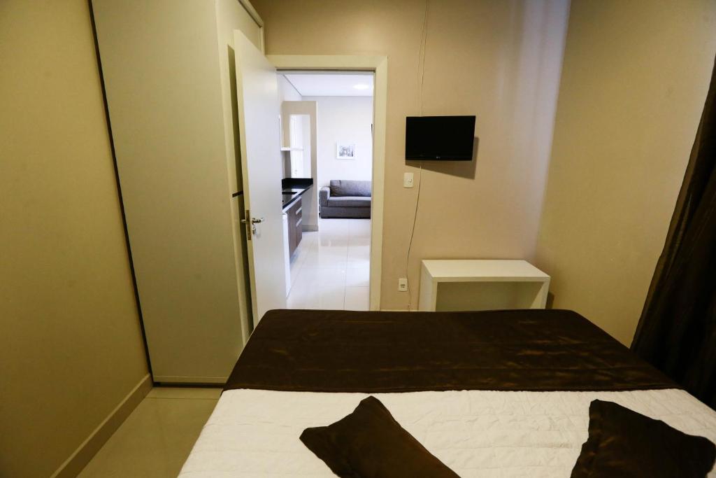 Postel nebo postele na pokoji v ubytování Hotel Emacite Flex