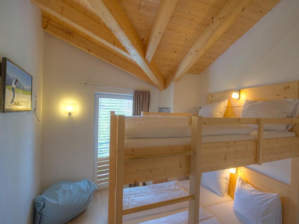 Posteľ alebo postele v izbe v ubytovaní Residenz Kitzsteinhornblick by Kaprun Rentals