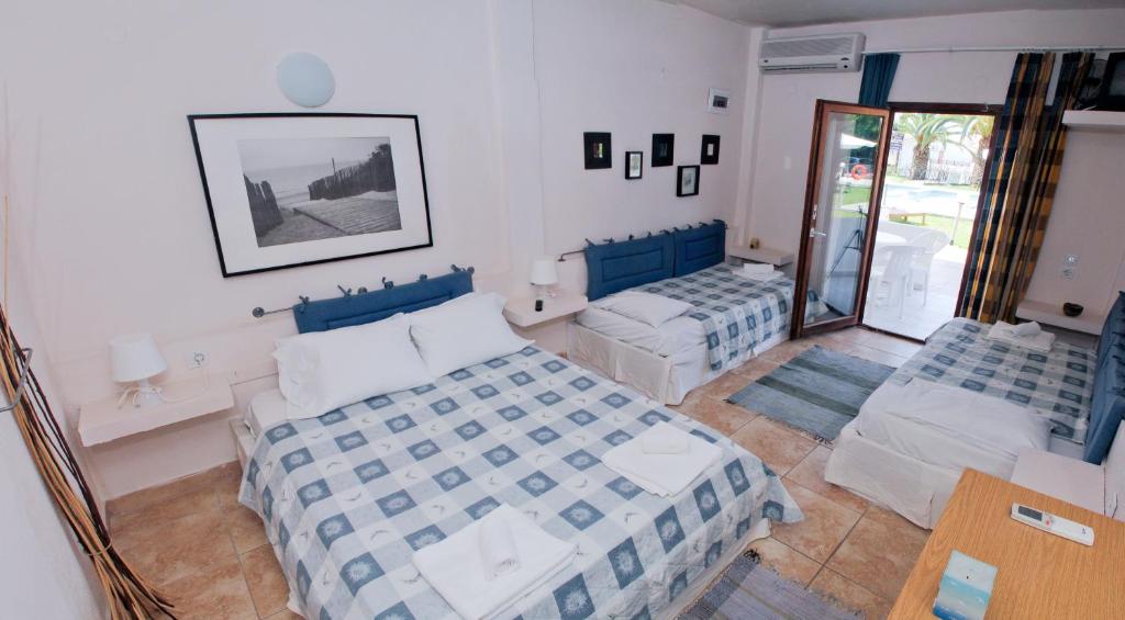 Postel nebo postele na pokoji v ubytování Hotel Idea
