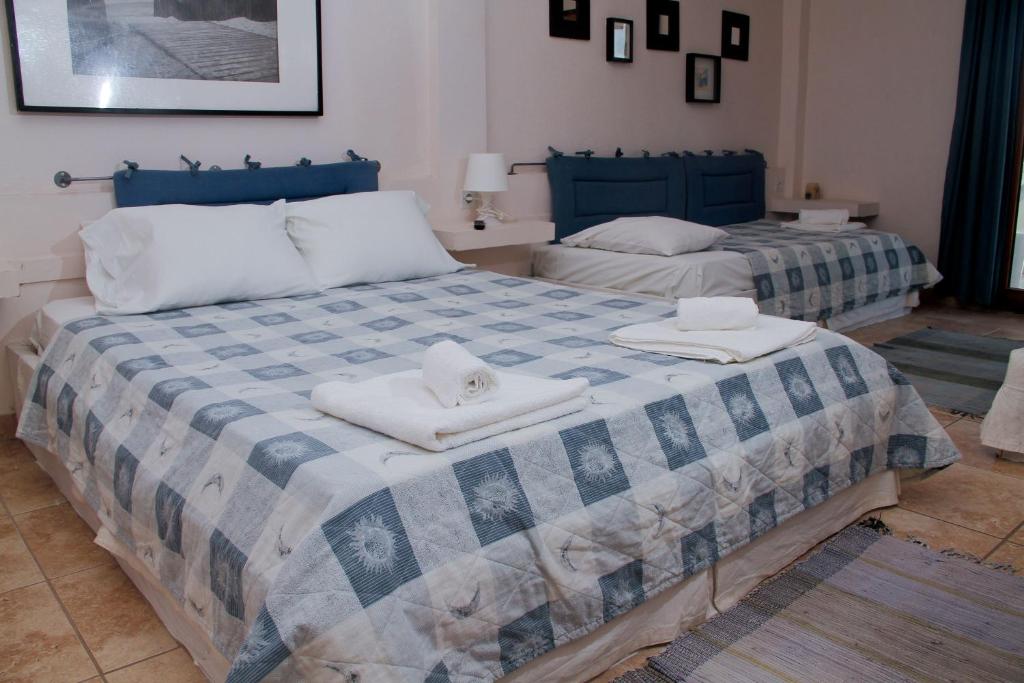 Postel nebo postele na pokoji v ubytování Hotel Idea