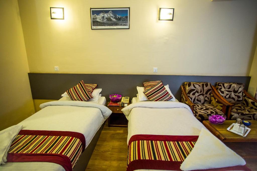 Postel nebo postele na pokoji v ubytování Hotel Crown Plaza