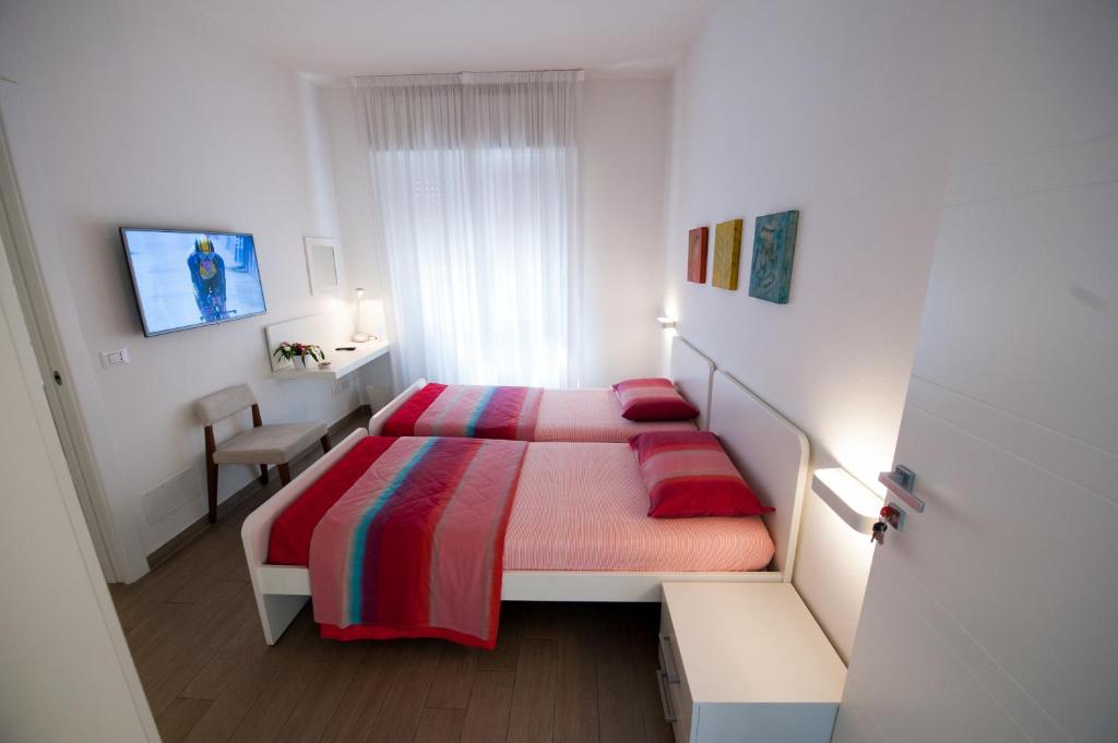 Postel nebo postele na pokoji v ubytování Daniela B&B Fiera