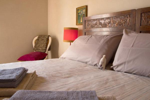Postel nebo postele na pokoji v ubytování B&B Corte Vignazza