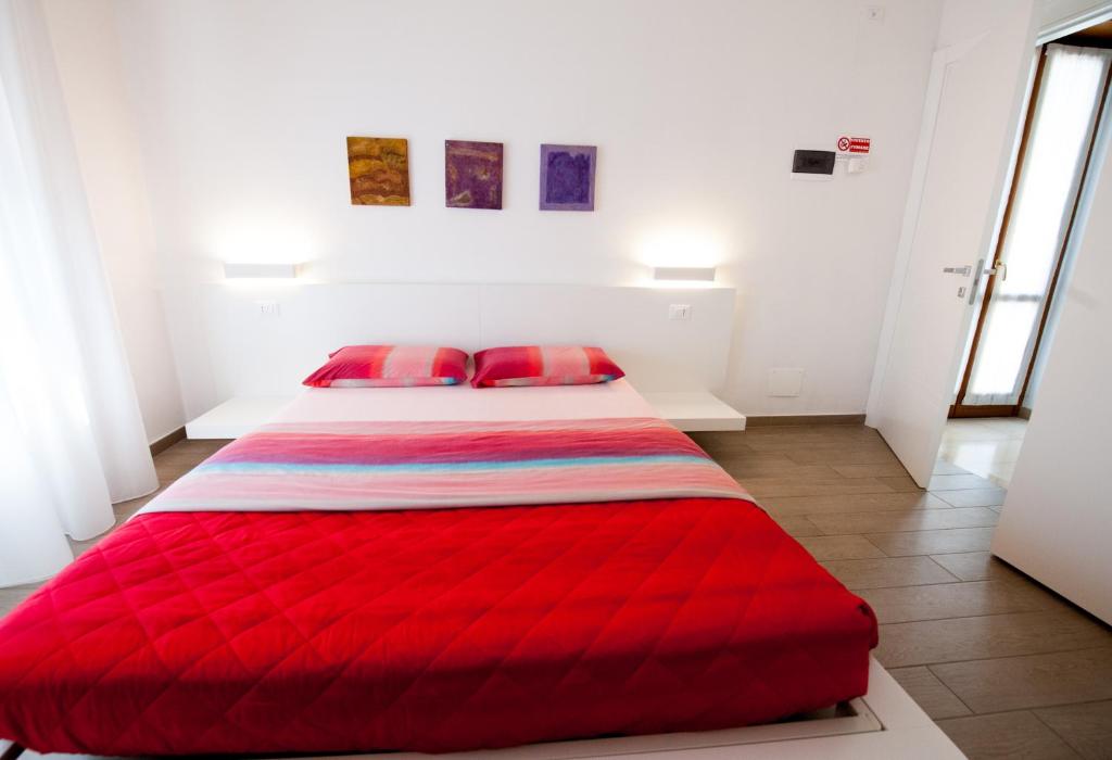 Postel nebo postele na pokoji v ubytování Daniela B&B Fiera