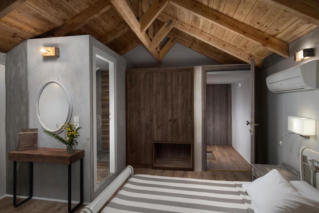 Postel nebo postele na pokoji v ubytování Morfeas Hotel