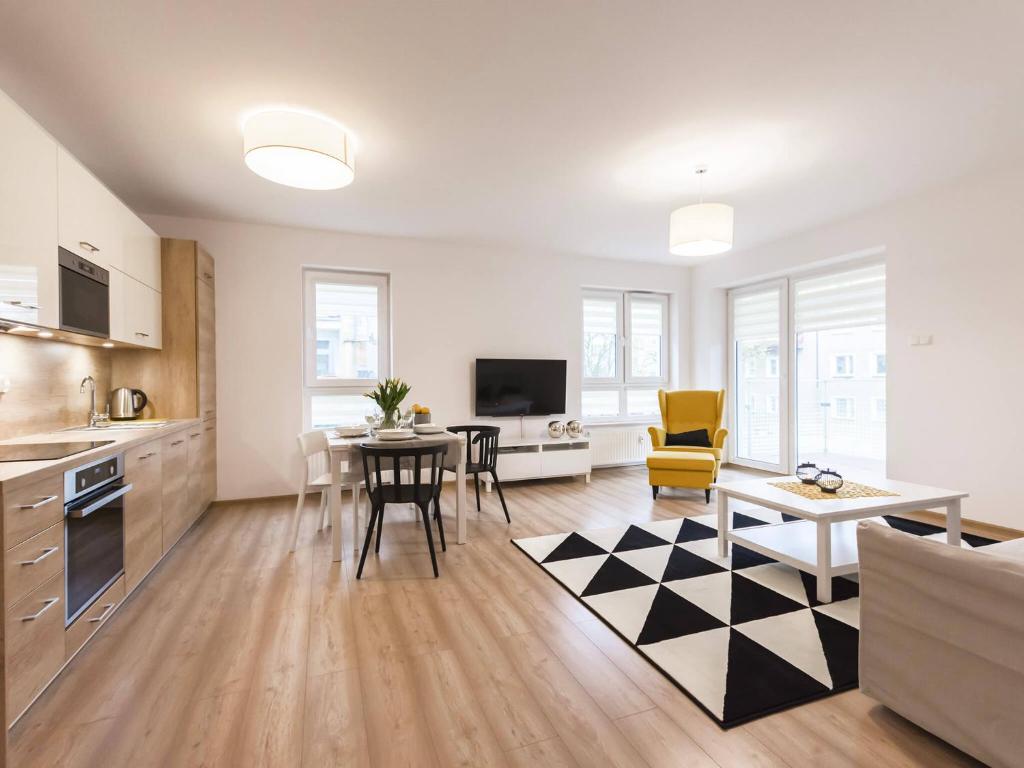 TV a/nebo společenská místnost v ubytování VacationClub - Solna Apartment C103