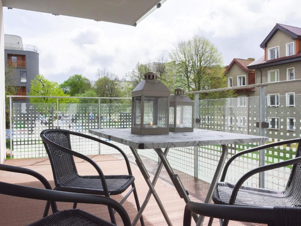 Balkón nebo terasa v ubytování VacationClub - Solna Apartment C103