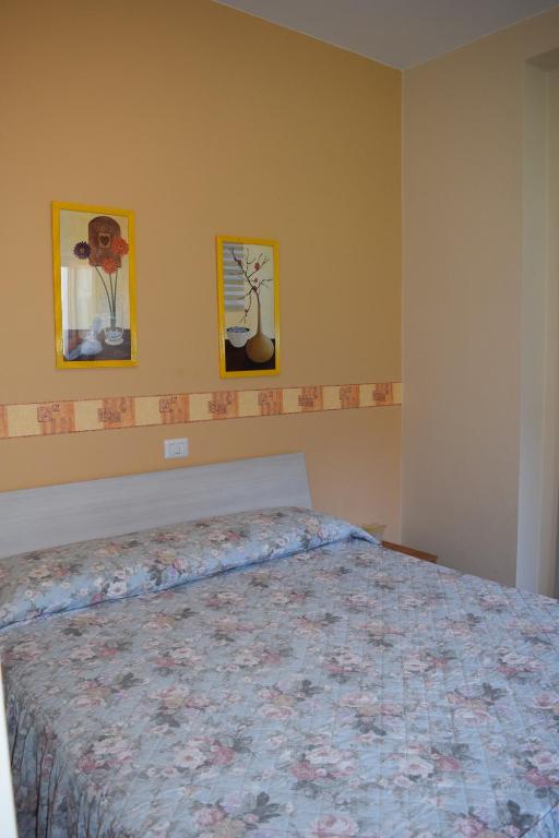 Una cama o camas en una habitación de Albergo De Jean
