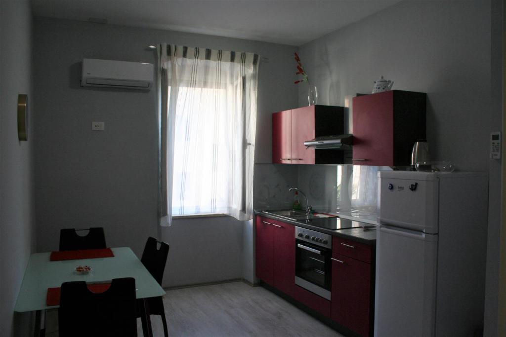Kuchyňa alebo kuchynka v ubytovaní Pavelin apartments