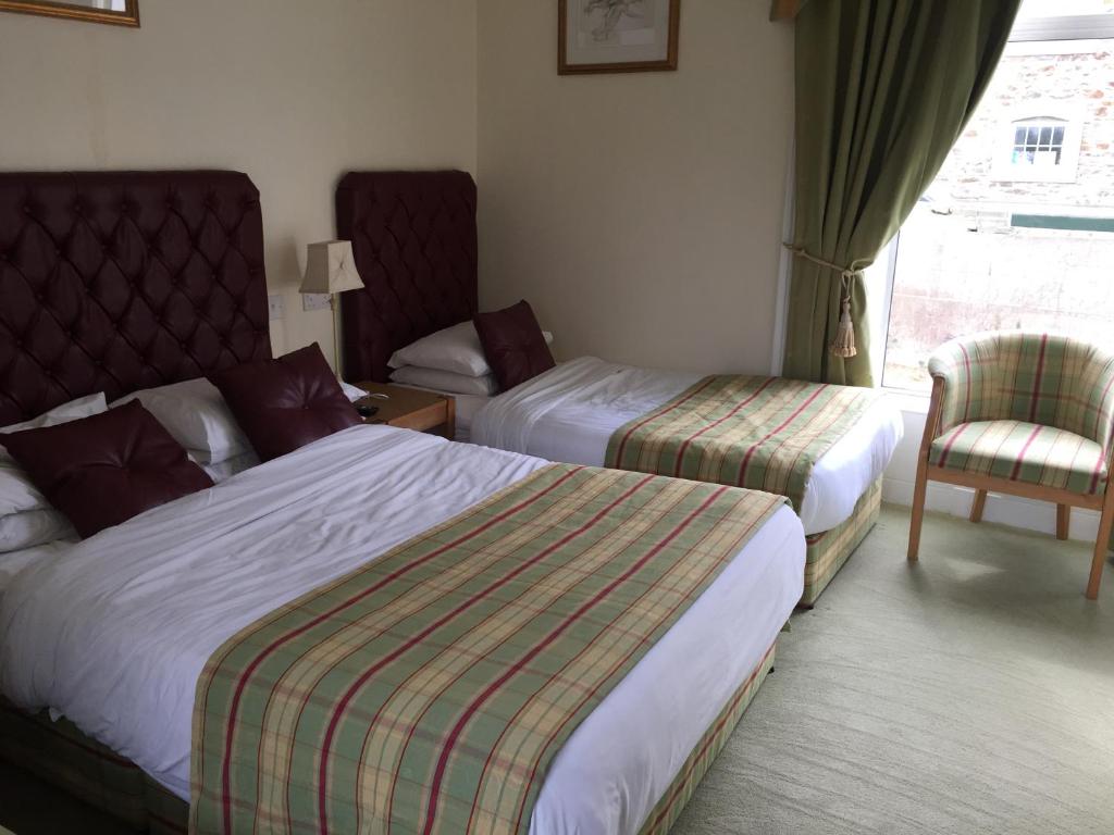 Postel nebo postele na pokoji v ubytování Faythe Guesthouse