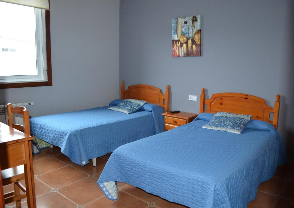 Ένα ή περισσότερα κρεβάτια σε δωμάτιο στο Casa Alonso