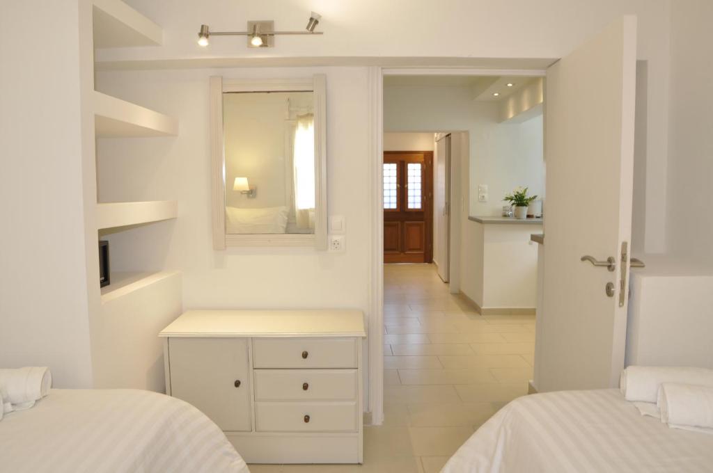 Postel nebo postele na pokoji v ubytování Ava Apartments