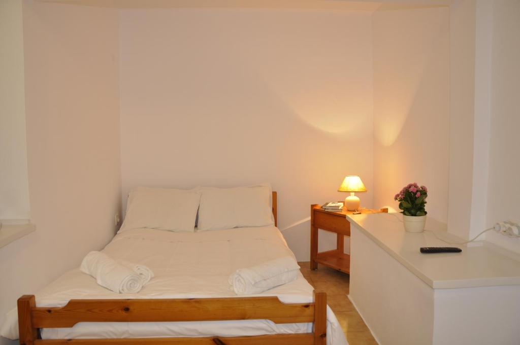 Postel nebo postele na pokoji v ubytování Ava Apartments