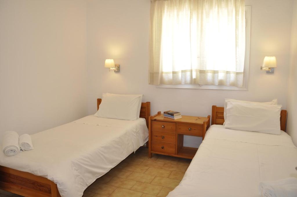 Postel nebo postele na pokoji v ubytování Ava Apartments