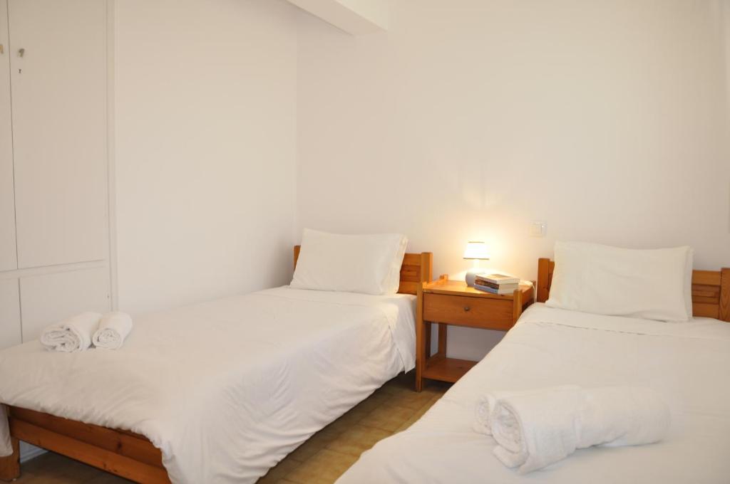 Postel nebo postele na pokoji v ubytování Ava Apartments