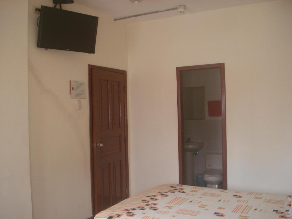 Postel nebo postele na pokoji v ubytování Hotel Murcia