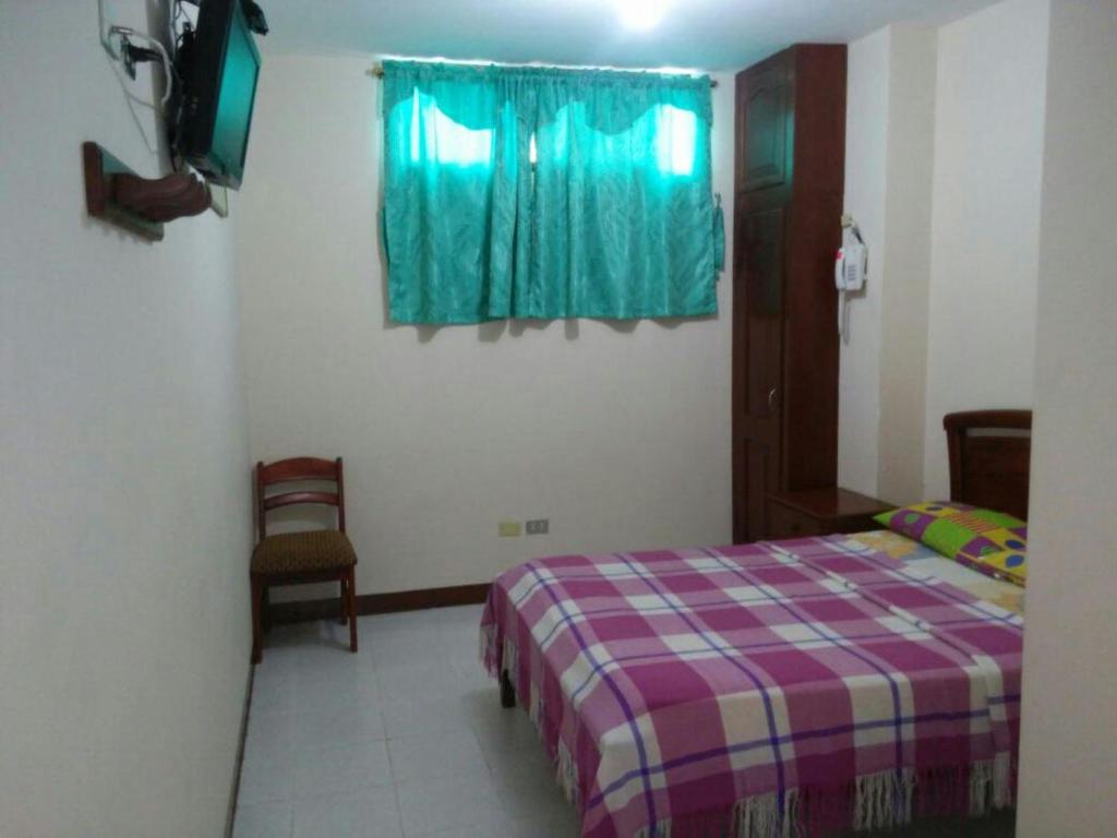 Postel nebo postele na pokoji v ubytování Hotel Murcia