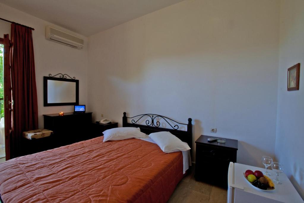 Postel nebo postele na pokoji v ubytování Hotel Milton
