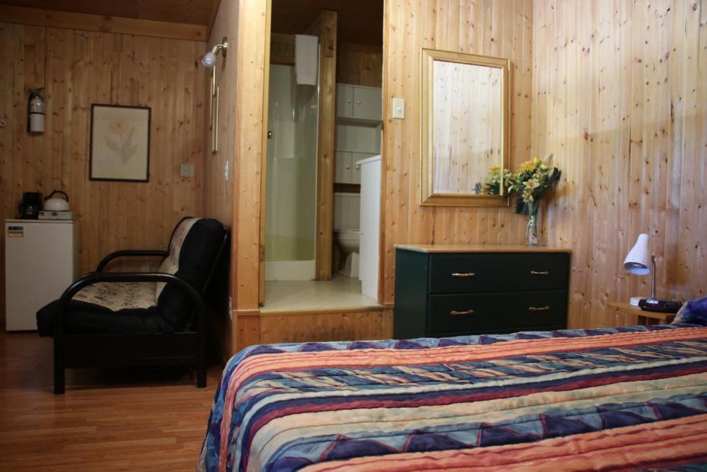 Postel nebo postele na pokoji v ubytování Lac Des Roches Resort