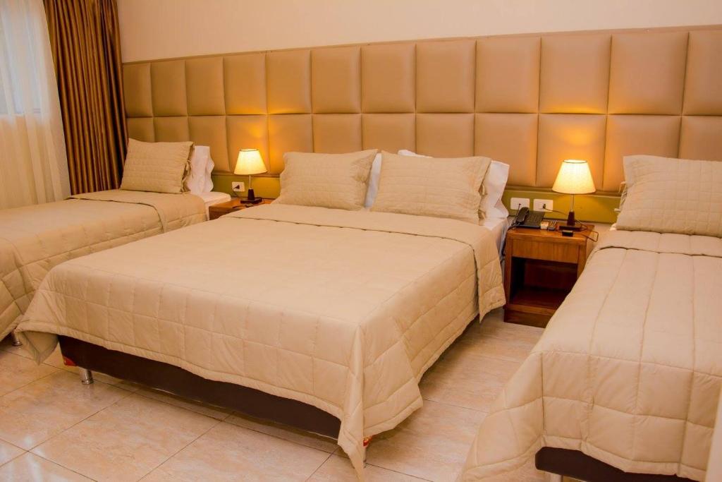 Postel nebo postele na pokoji v ubytování Hotel Hohenau