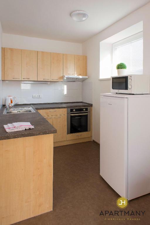 Eldhús eða eldhúskrókur á Apartmány Jindřichův Hradec
