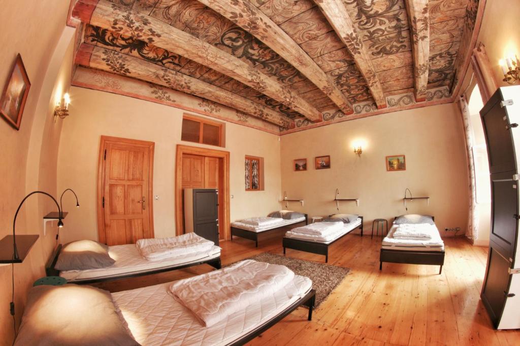 Postel nebo postele na pokoji v ubytování Hostel HOMEr - Old Town Square